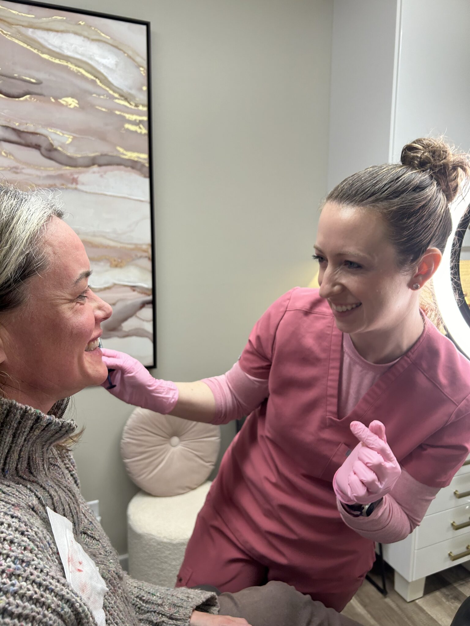 Client treatment moment at Alpenglow Aesthetique